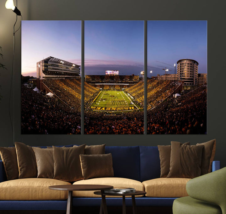 The Iowa Hawkeyes Kinnick Stadium Wall Art Canvas Print captures a sunset scene, making it perfect for display on a wall.