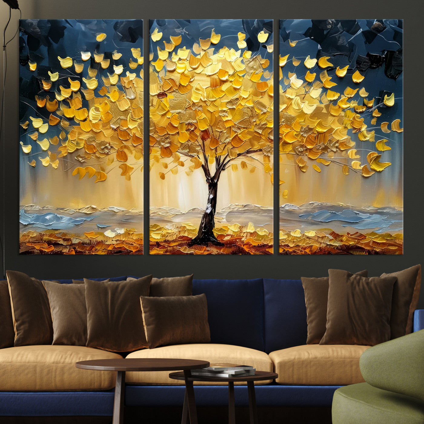 Canvas of a golden autumn tree with textured brushstrokes and moody blue skies, perfect for dramatic and vibrant home decor.