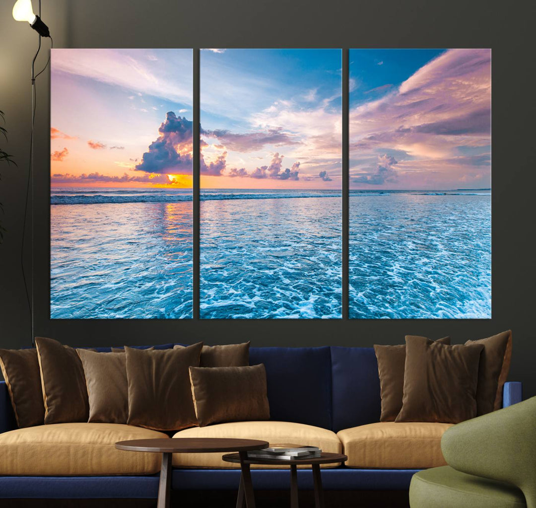 An Ocean Sunset Canvas Wall Art depicting a vibrant sky and rolling waves.