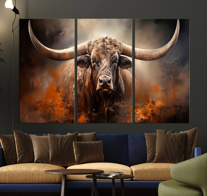 A Highland Bull with striking horns is depicted in a fiery abstract style on a ready-to-hang wall art canvas, evoking strength.