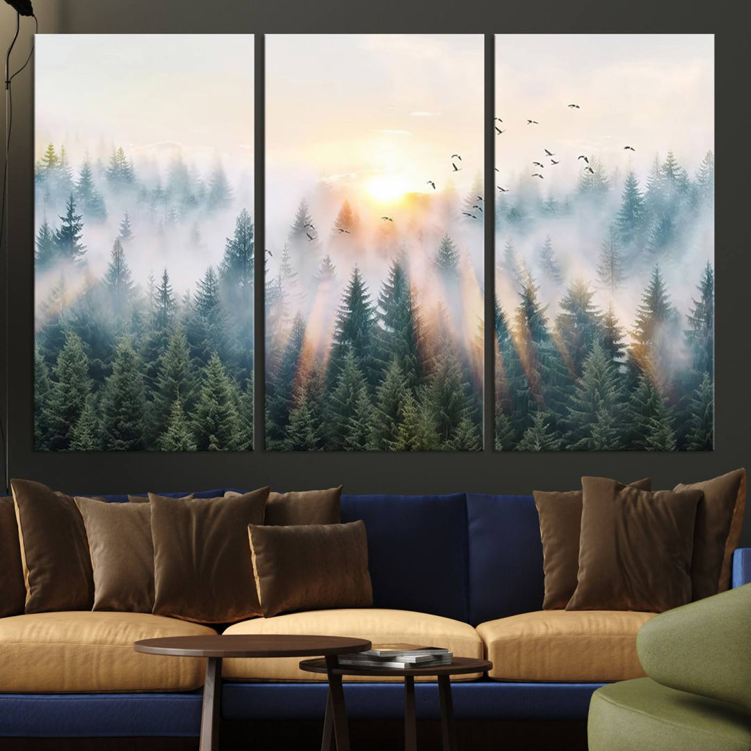 Misty Pine Forest Wall Art: A depiction of sunrise over foggy trees and birds against a bright sky; a framed woodland scene ideal for home or office decor.