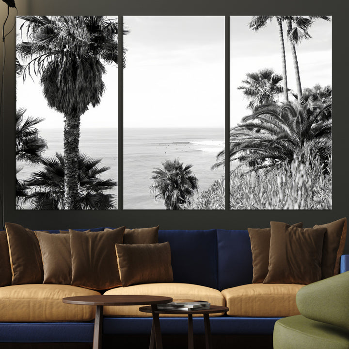 Monochrome canvas of palm trees framing a coastal surf scene, perfect for California-inspired or retro black-and-white beach decor.