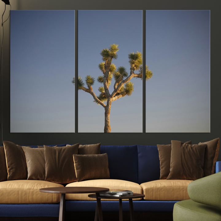 A lone Joshua Tree standing against a deep blue sky, capturing the serene and rugged beauty of the Southwestern desert landscape.