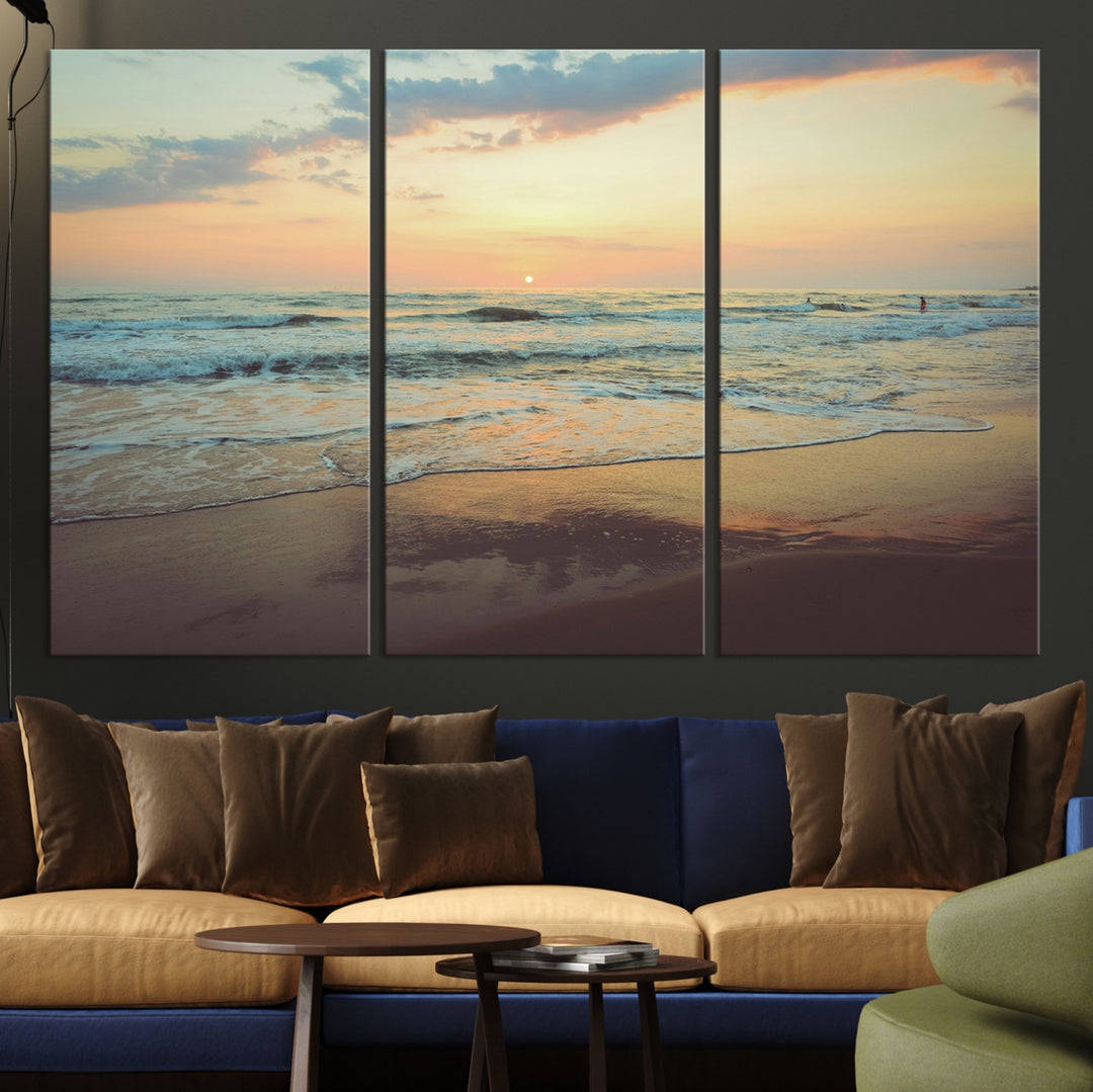 Warm sunset over gentle ocean waves with pastel sky and reflections on wet sand, creating a calm and soothing beach ambiance.