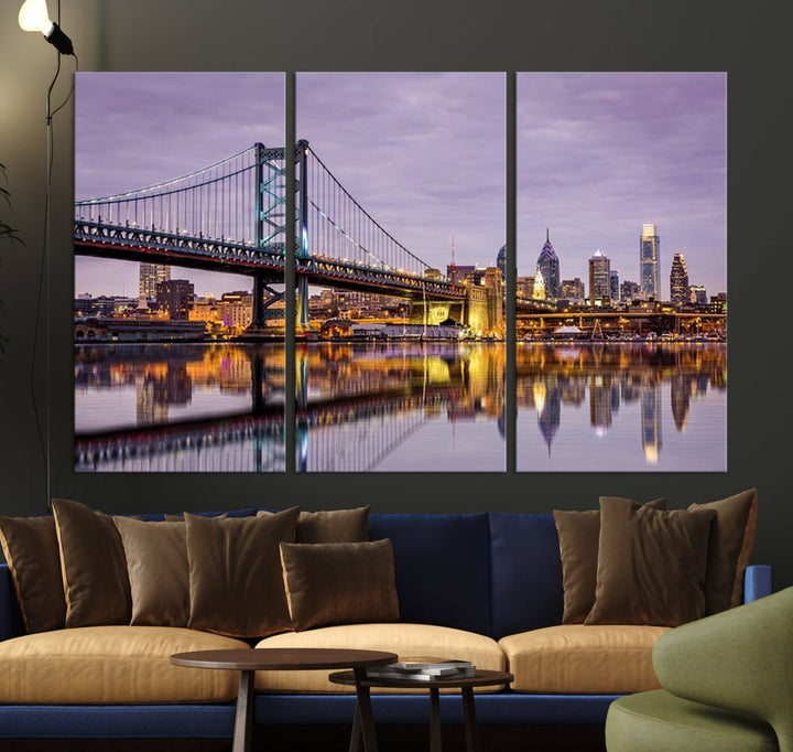 A woman holds the Philadelphia Ben Franklin Bridge Wall Art Canvas Print, a gallery-quality photo showcasing a city skyline with the bridge reflecting on the river. This stunning piece would make an excellent addition as premium canvas wall art for any home.