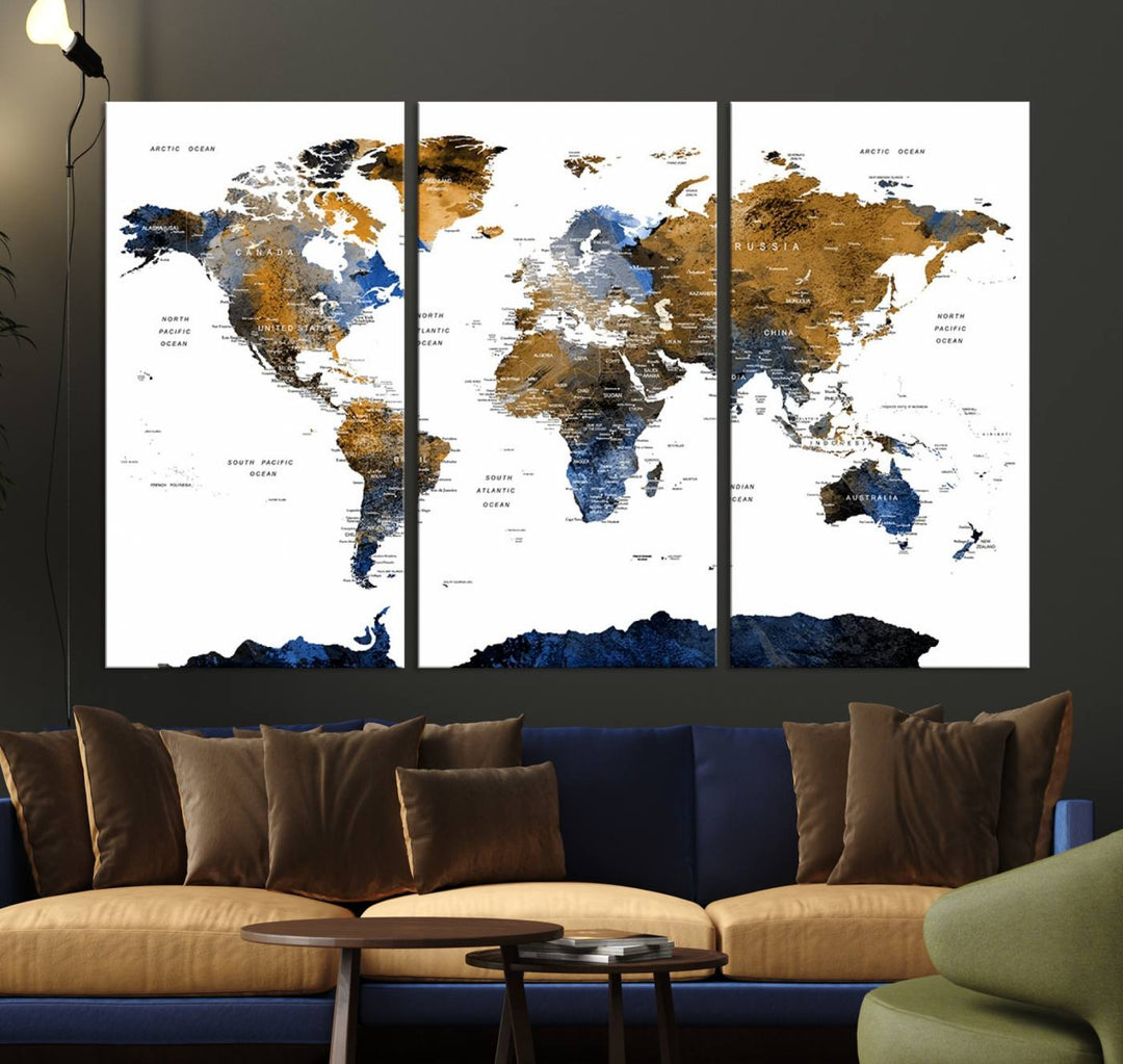 The Triptych Modern World Map Canvas in blue and brown is an ideal global decor piece for enhancing living rooms or offices. It comes ready to hang.