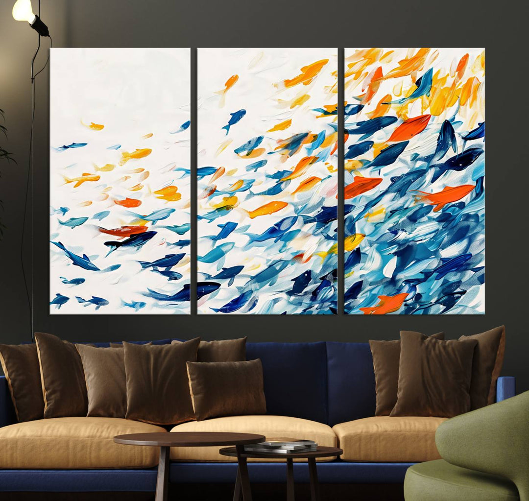 A colorful Abstract Fish Shoal Canvas Print hangs on the wall.