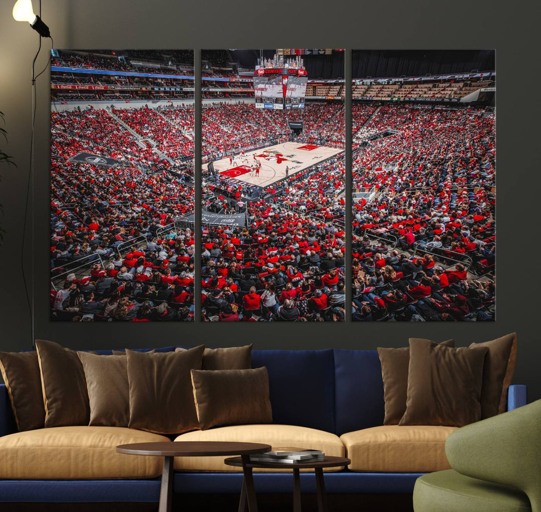 A painting of Louisville Cardinals fans in red at the KFC Yum Center Arena.