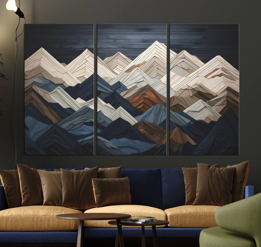 A geometric mountain range wood style wall art in shades of blue, gray, and brown; a 3-piece abstract set perfect for modern rustic decor.