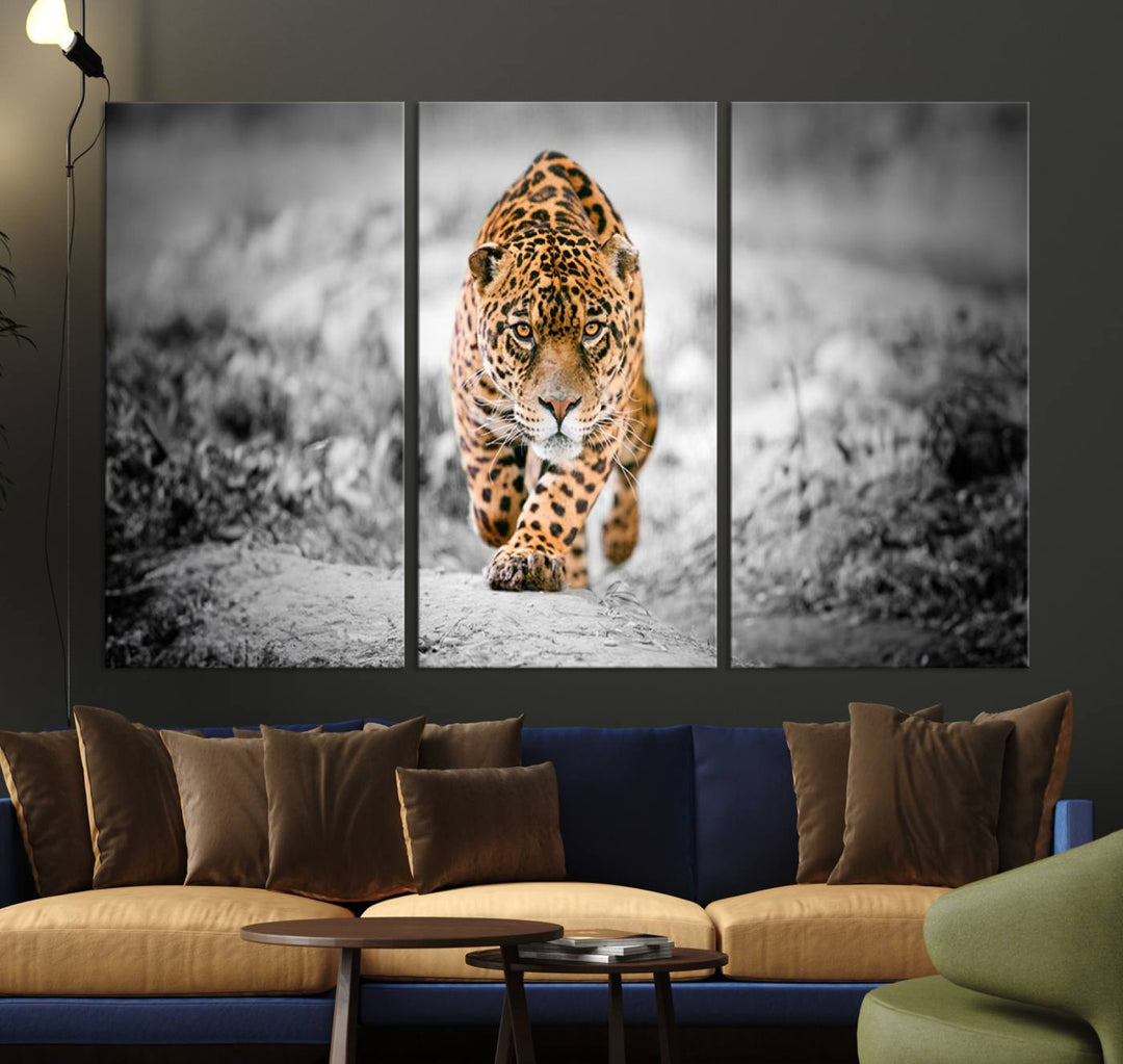 A striking three-panel "Jaguar Stalking Wall Art Canvas Print - Majestic Big Cat in Focused Pursuit" features a leopard walking forward, set against a black and white background.