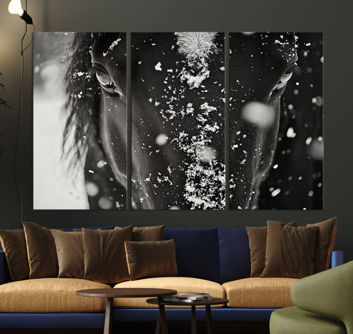 The Winter Horse Snow Wall Art Canvas Print, a black and white triptych showcasing a snow-covered horse's face, infuses the space with rustic cabin decor.