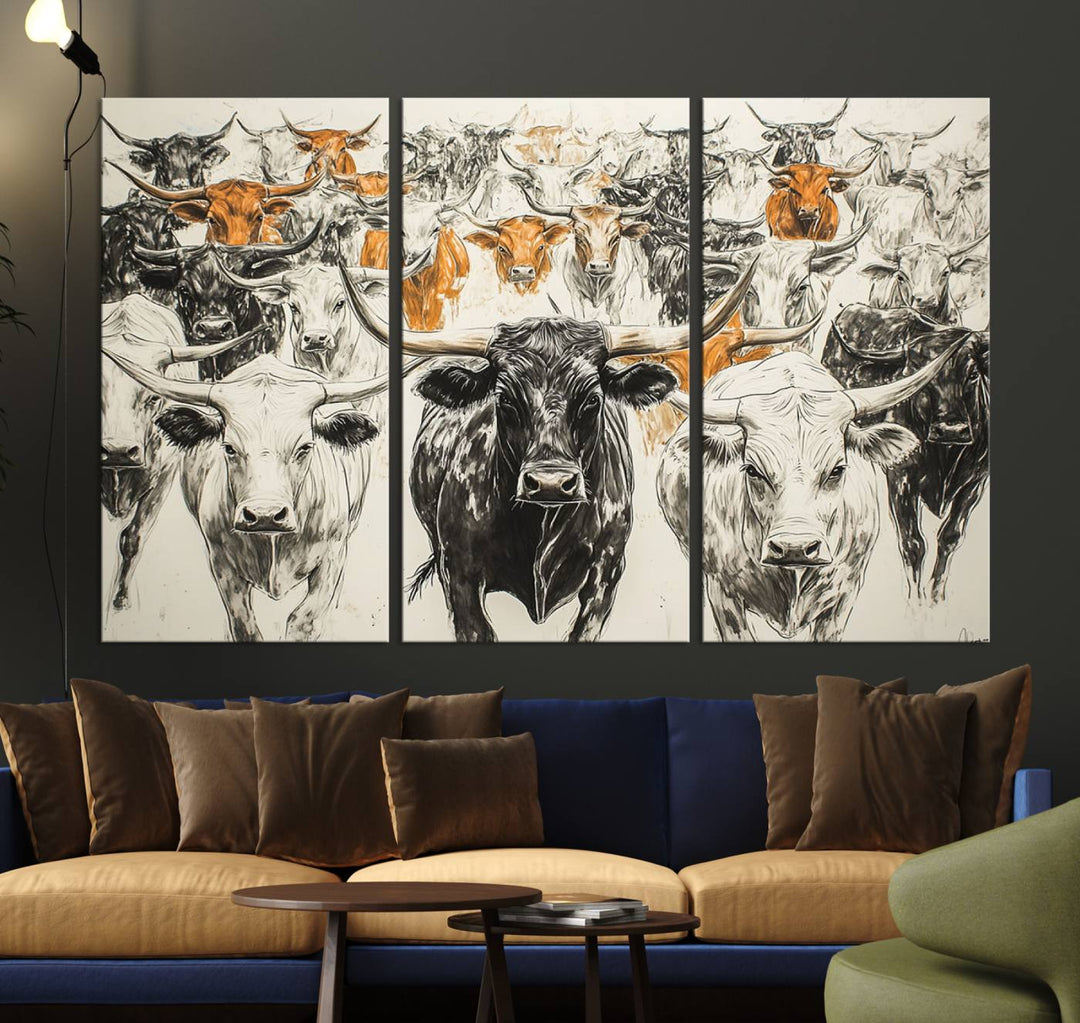 This exquisite farmhouse wall art, titled "Western Longhorn Cattle Canvas Print," showcases a majestic herd of longhorn cattle in a three-panel design. This ready-to-hang and framed barn decor infuses your space with rustic charm.