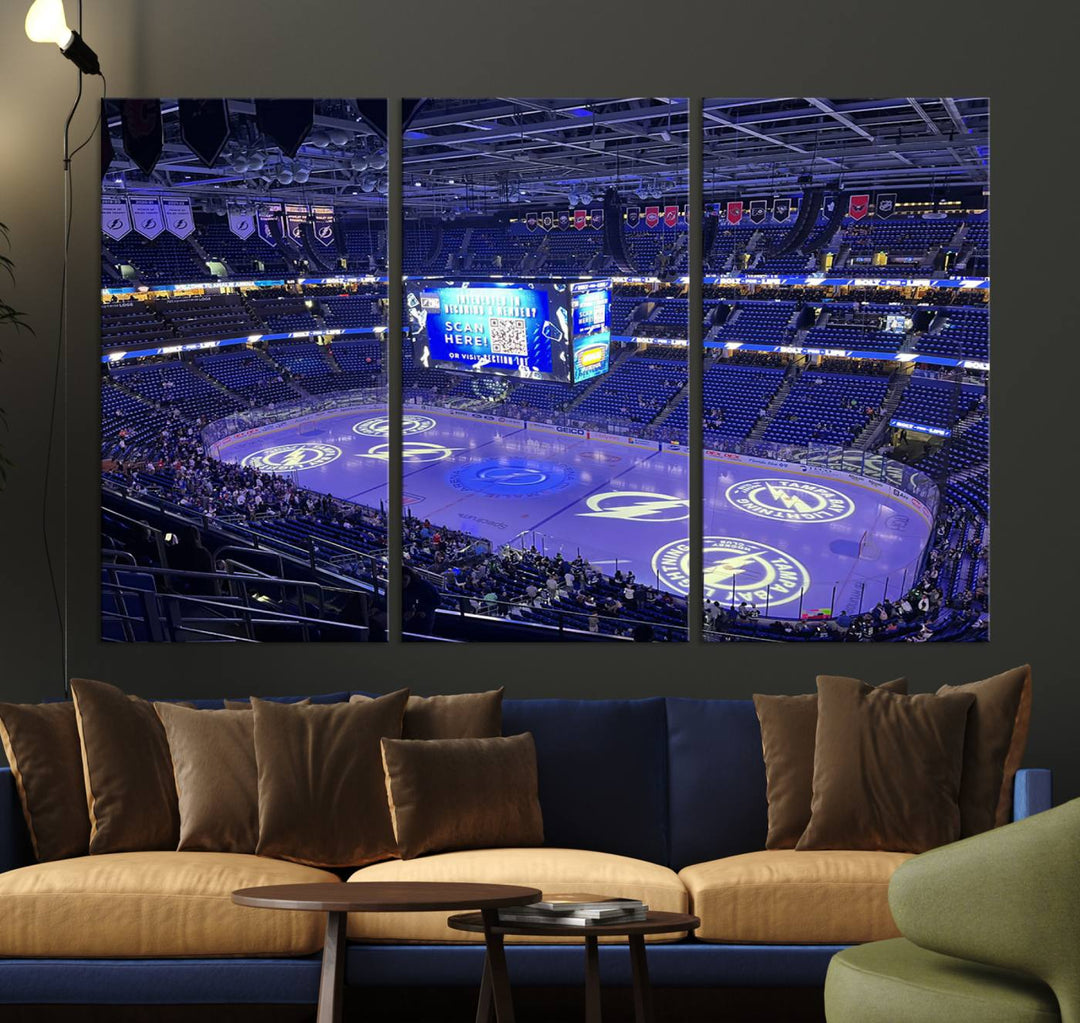 The wall art canvas print at Amalie Arena features team logos on ice, encapsulating the vibrant atmosphere of an NHL hockey stadium.