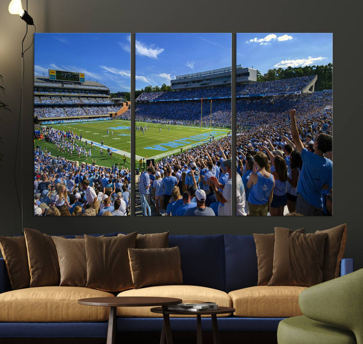 A gallery-quality canvas wall art print featuring the University of North Carolina Tar Heels Football Team and Chapel Hill's Kenan Memorial Stadium adorns the cafe wall.