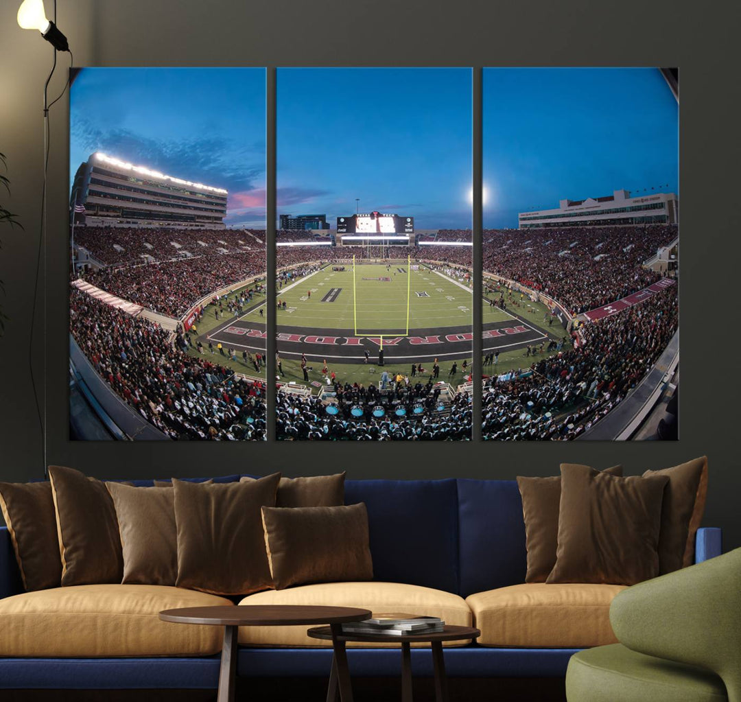 The wall art in the living room features a Texas Tech Red Raiders Football Team Print, showcasing Jones AT&T Stadium at dusk.