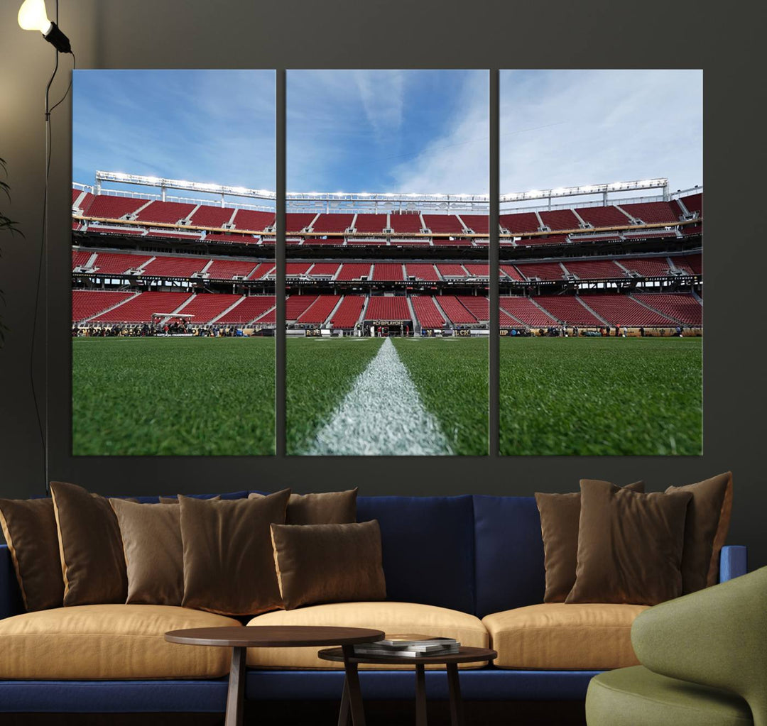 A canvas print of the University of Tulsa Golden Hurricane showcases H.A. Chapman Stadiums football field and red seats against a backdrop of a blue sky.