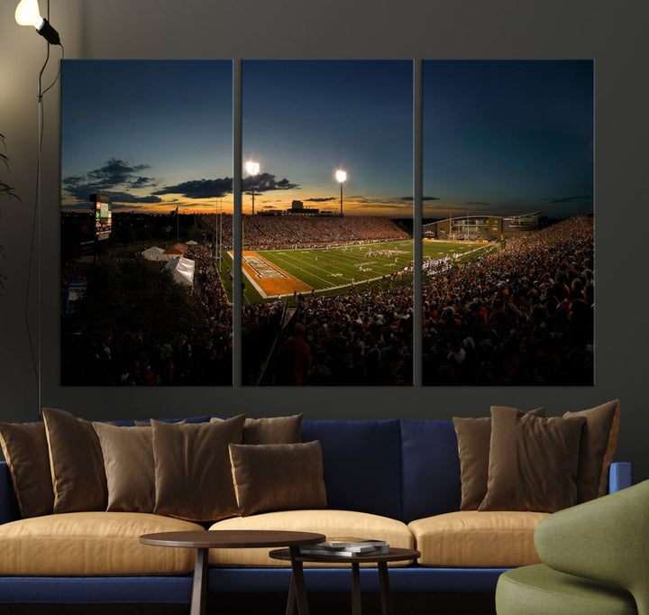 Ball State Cardinals Football Team Print - Muncie Scheumann Stadium Canvas featuring a sunset, floodlights, and lively crowd.