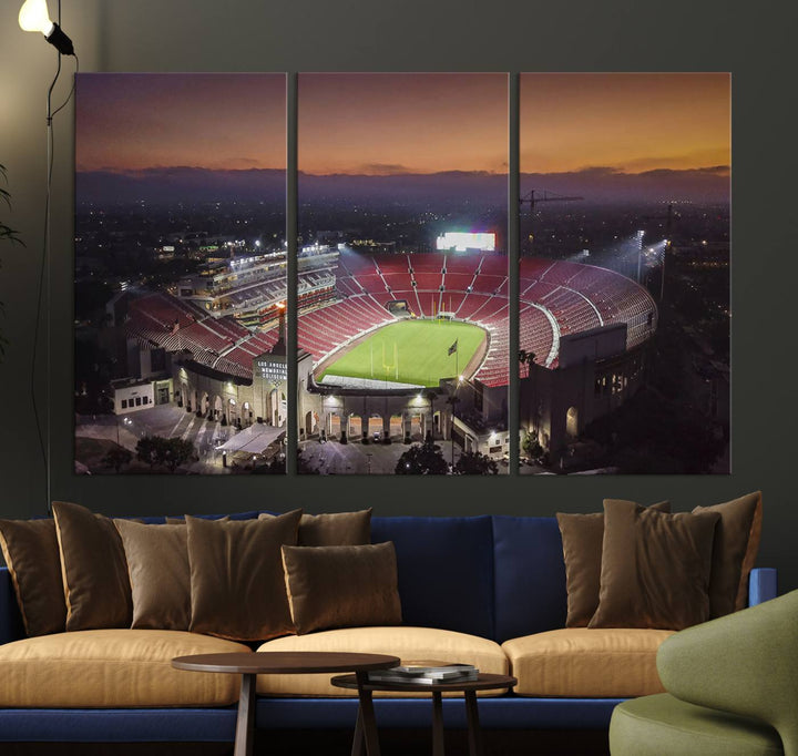 The USC Trojans Stadium canvas captures Memorial Coliseum at twilight, showcasing red seats and a green field beneath an orange sky.