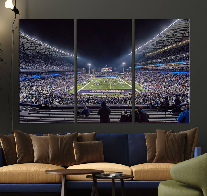 A canvas print titled The University of Washington Huskies Football depicts a packed Husky Stadium at night, as seen from the stands.