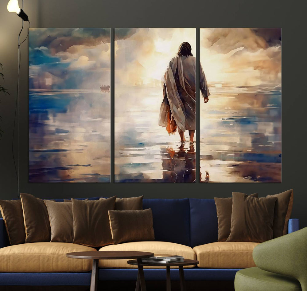 The wall art depicts a robed figure walking on water towards a boat, framed by a stunning sunset. This is showcased in the Jesus Walking on Water Triptych Canvas Print.