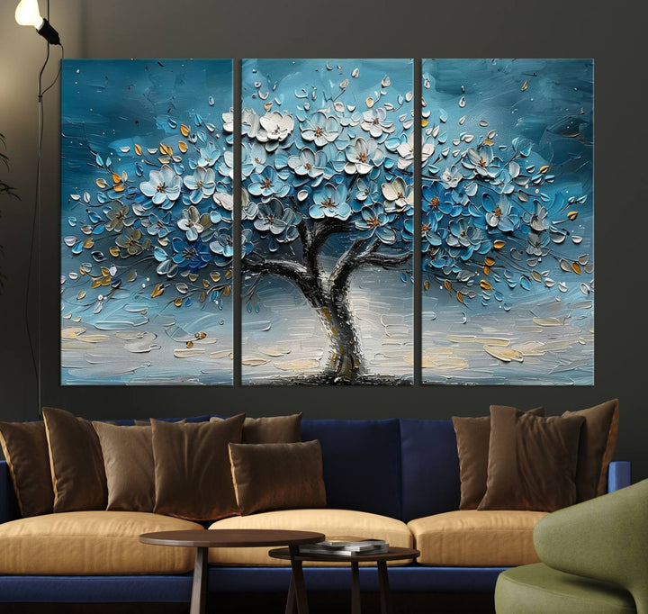 Abstract Blooming Tree Wall Art Print features blue, white, and gold textures on museum-quality canvas, perfect for modern decor.