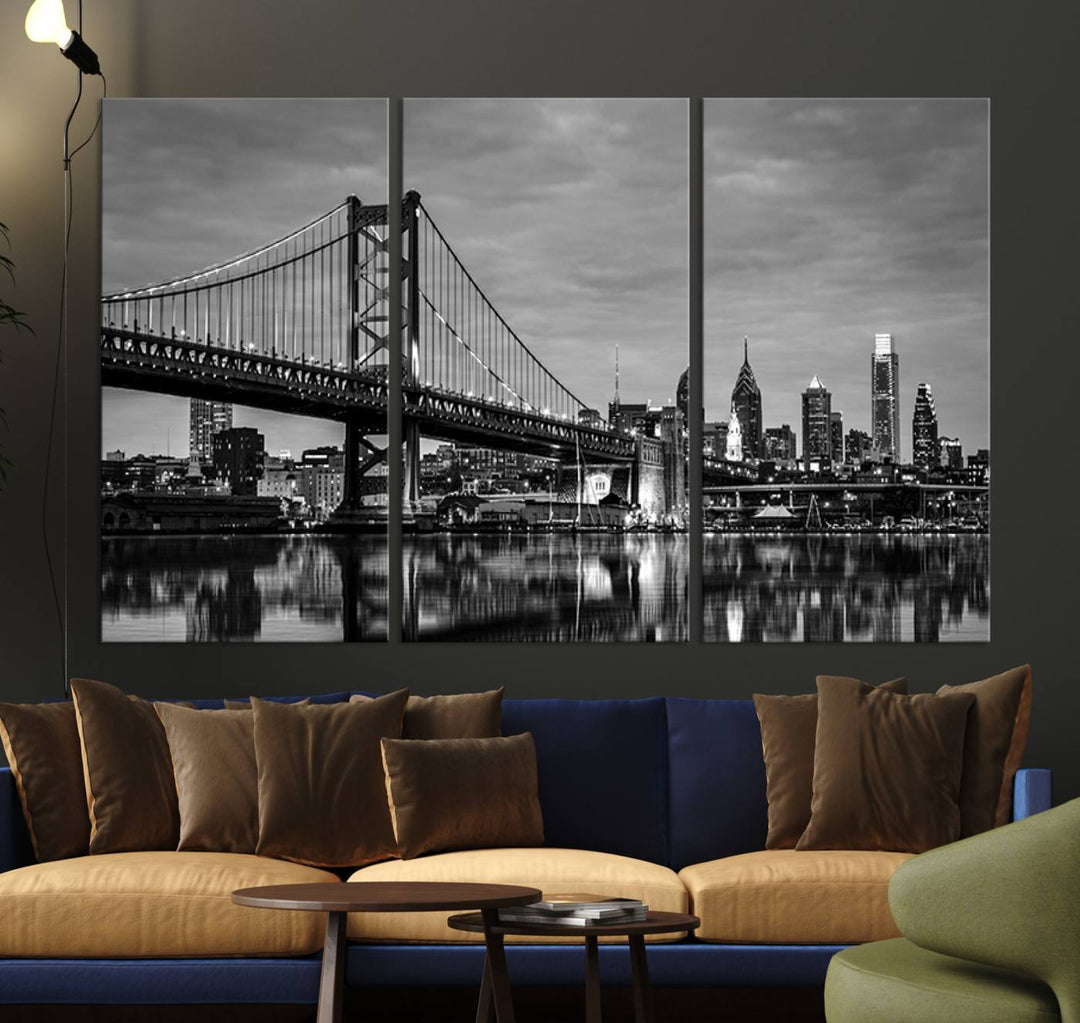 The "Large Wall Art Philadelphia Canvas Print" showcases a black-and-white depiction of the Ben Franklin Bridge with a water reflection.