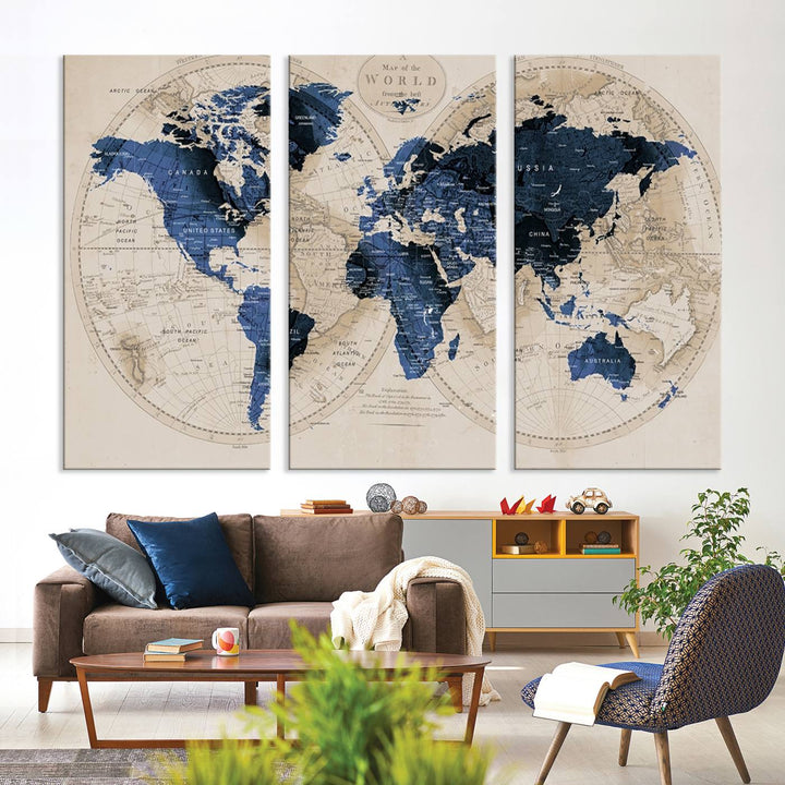 The Vintage Triptych Map Print is a grunge-stained blue and beige world map, perfect for enhancing wall decor.