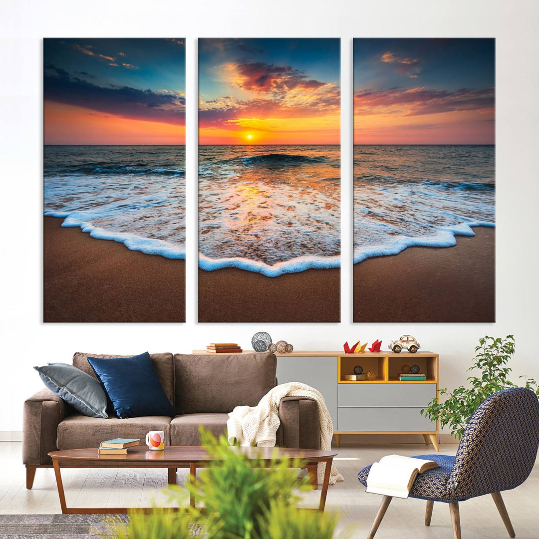 A Sunset with Calm Waves on the Beach Wall Art Canvas Print adorns the dining room.