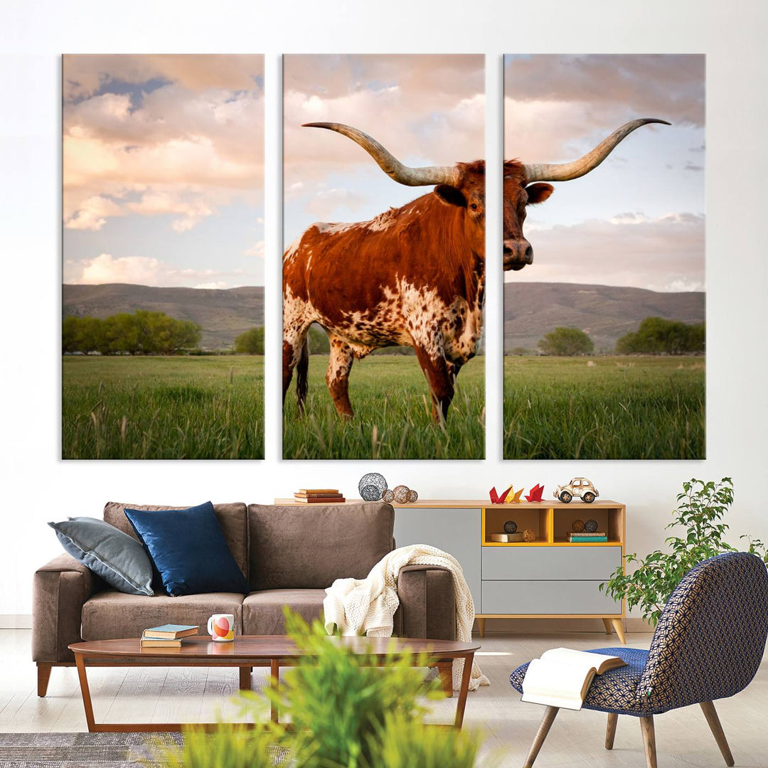 The Texas Cow Canvas Wall Art print captures a longhorn cow at sunset and is ready to hang.