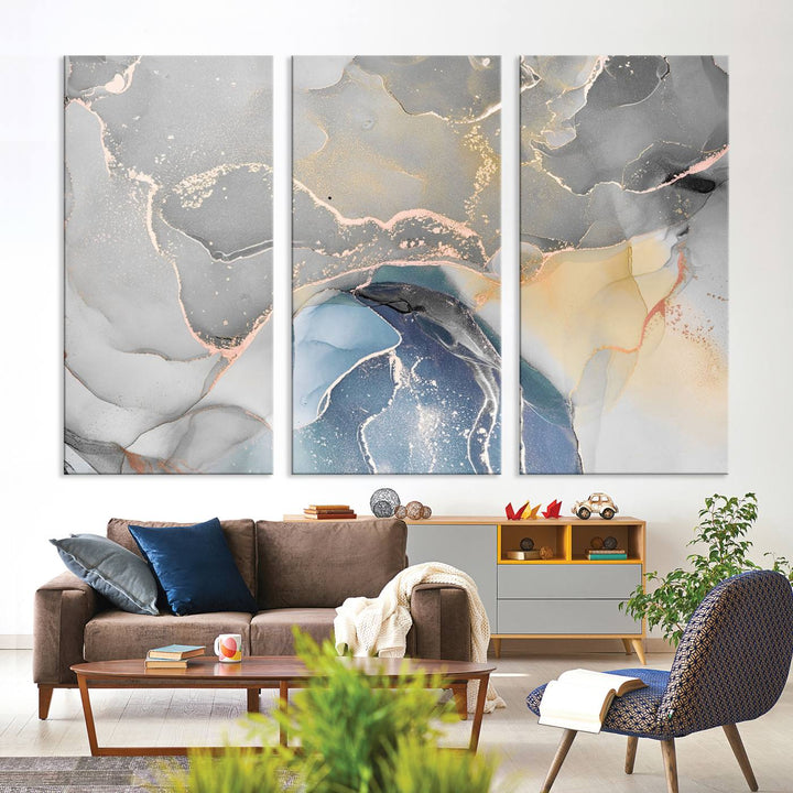 Gray Marble Fluid Effect Abstract Canvas with swirls of gray, gold, and blue.