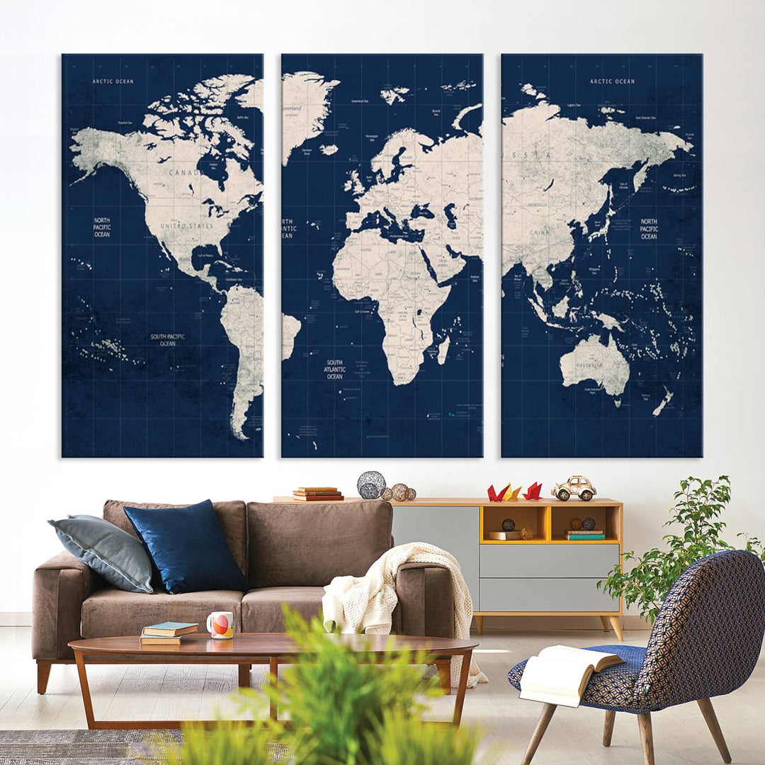 Large modern world map wall art canvas print in beige and navy; showcases a 3-panel vintage map design and is ready to hang.