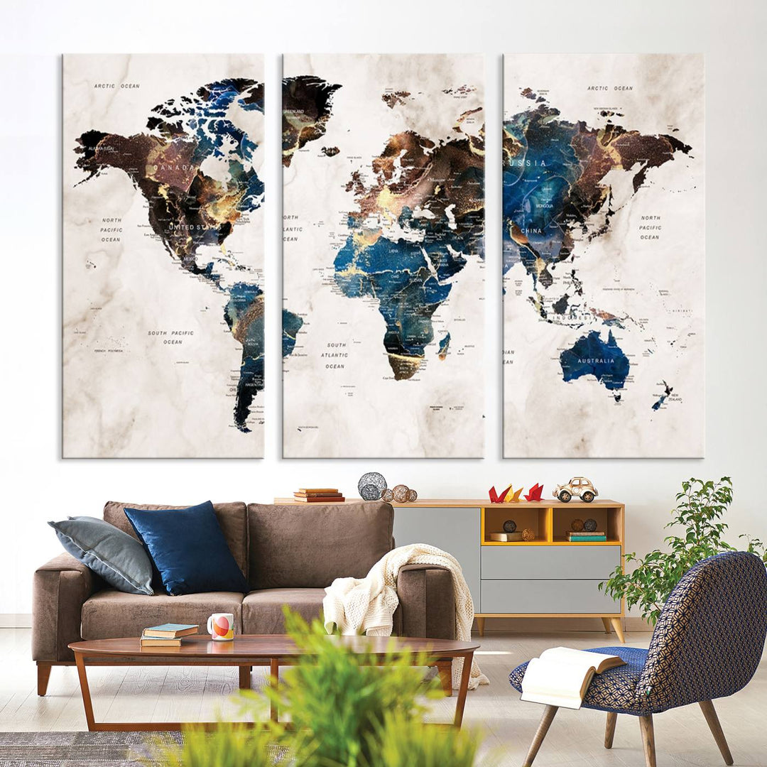 Abstract earth-toned 3-panel world map wall art featuring blues and browns, ready to hang; it showcases continents on modern canvas.