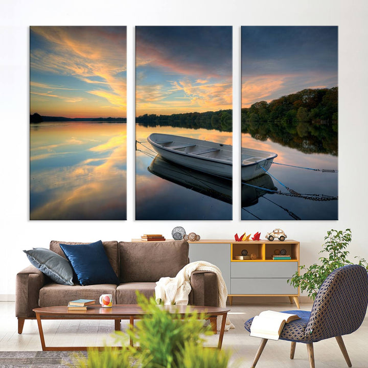 Serene rowboat on calm lake triptych canvas art with sunset reflections. Giclee print for tranquil home or office decor.