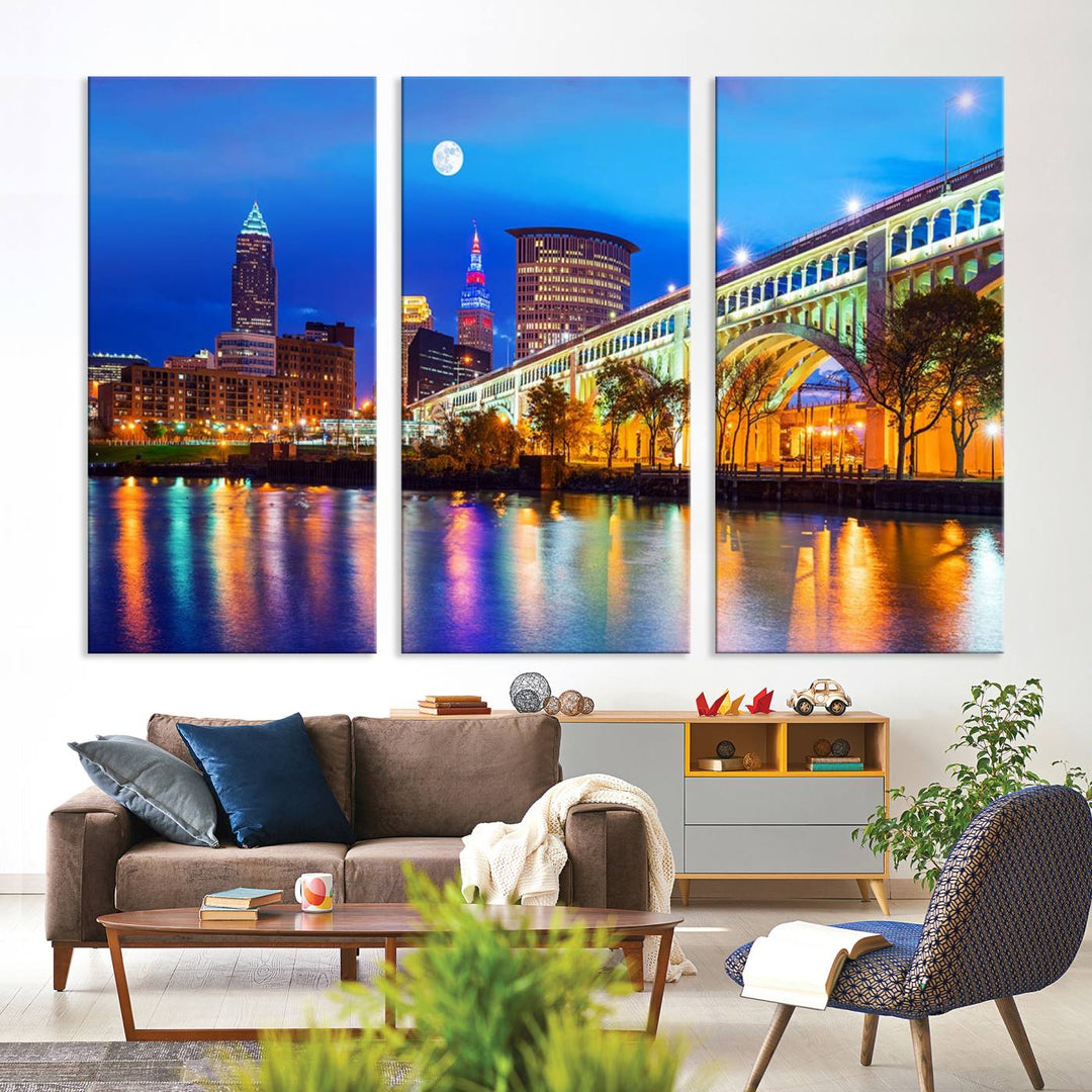 A Cleveland Night Skyline Wall Art on museum-quality canvas showcases a bridge and illuminated buildings.