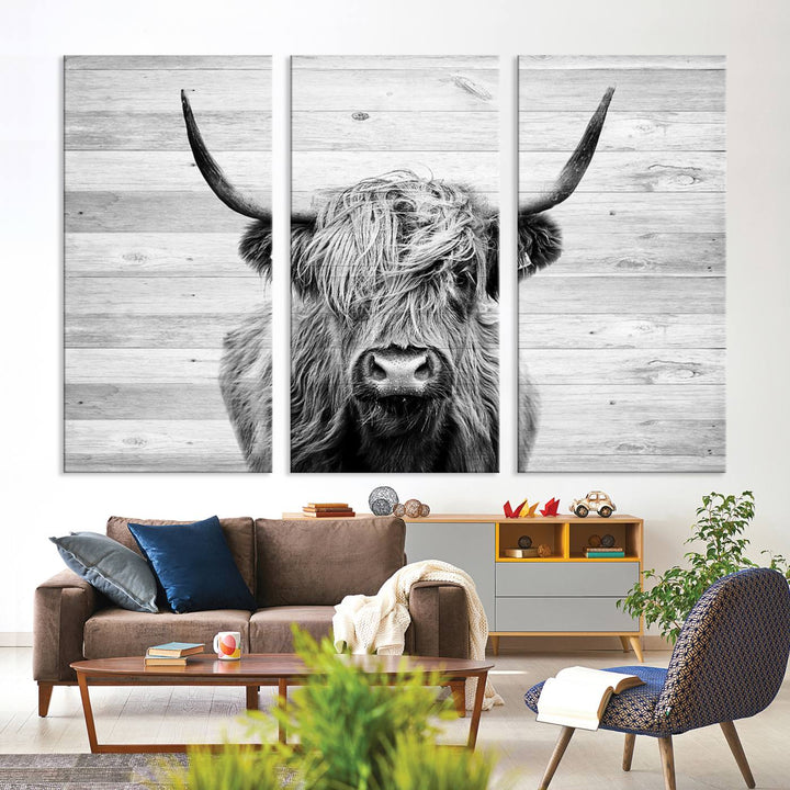 Scottish Highland Cow Cattle Art adds rustic farmhouse charm to the space.