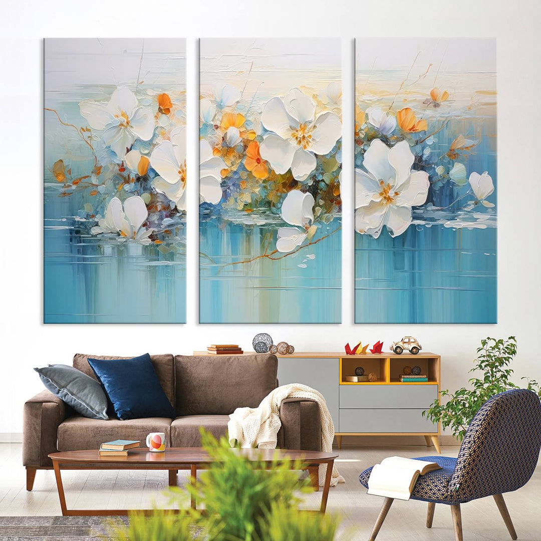 An Abstract Flower Wall Art Canvas Print in blue and orange hues.