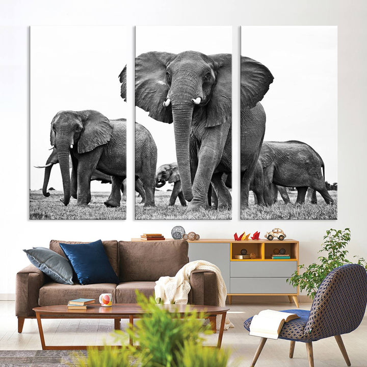 A modern dining area features a Black White Elephant Family Wall Art Canvas Print.