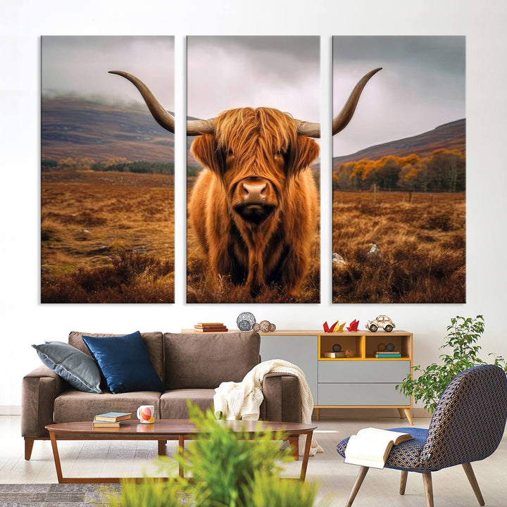 Highland Cow Longhorn Canvas Print, framed, on a wooden wall.