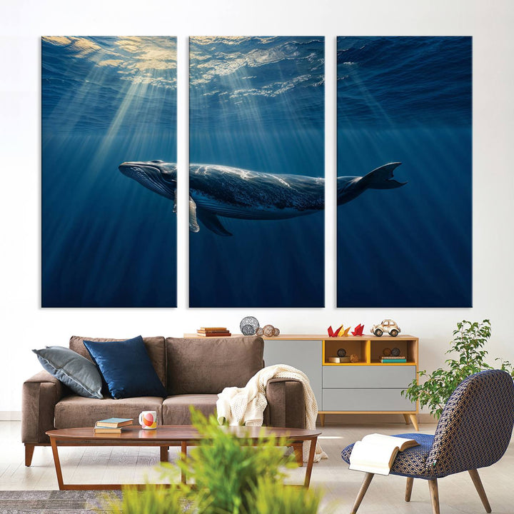 The Whale under Ocean wall art canvas print graces the white wall.