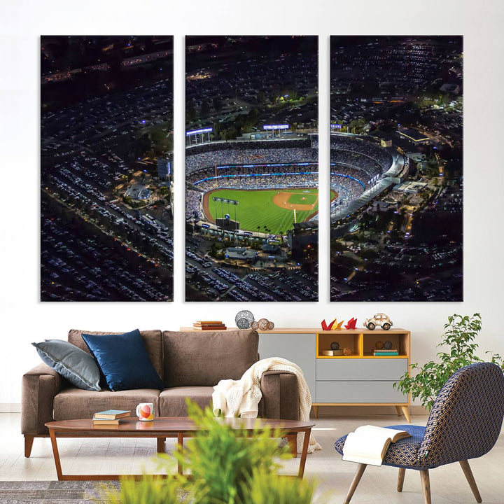 A large Los Angeles Dodgers print of Dodger Stadium at night is displayed near a window.