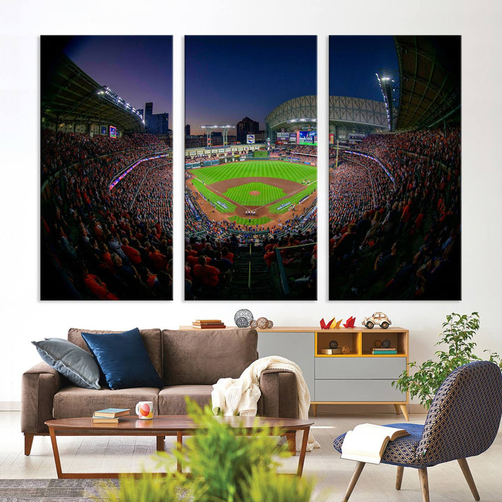 A canvas print of Houston Minute Maid Park at dusk is mounted on the wall.