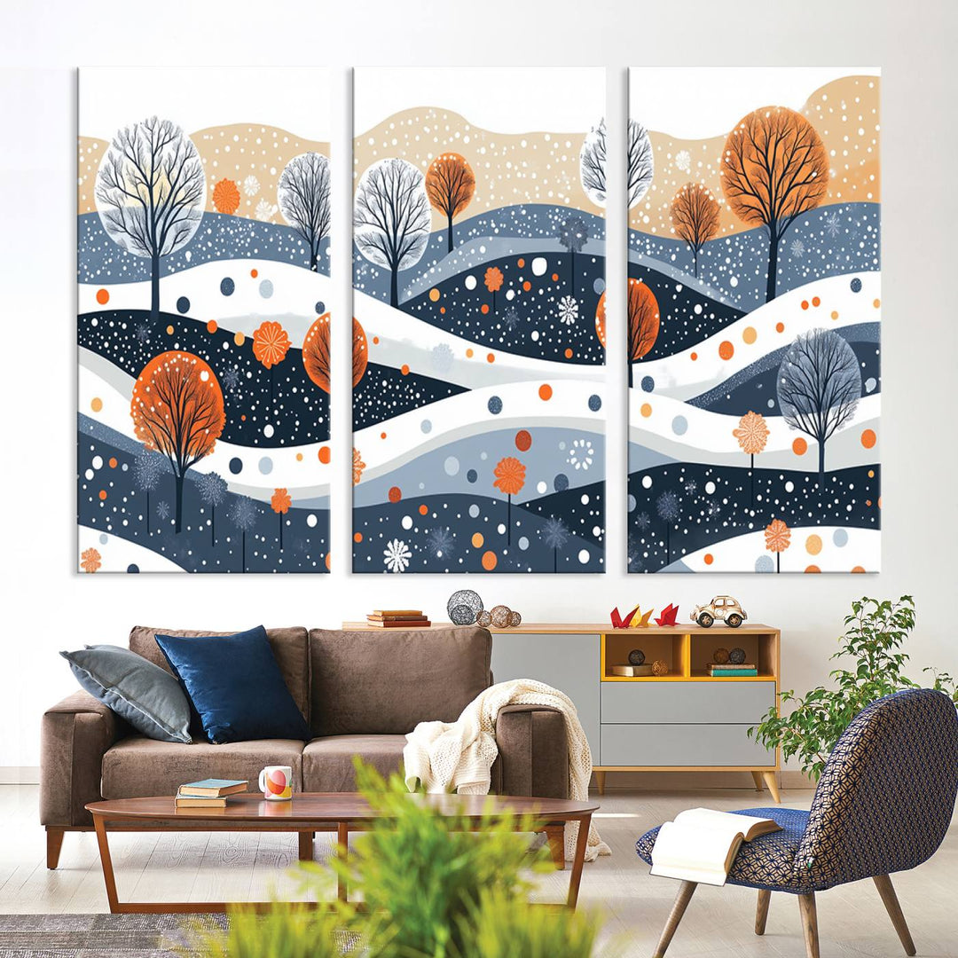 The "Abstract Winter Landscape Canvas Wall Art Print," featuring a triptych of landscapes with trees and hills in vibrant orange, white, and blue hues, adds a gallery-quality finish that transforms the space into an art lover's dream.