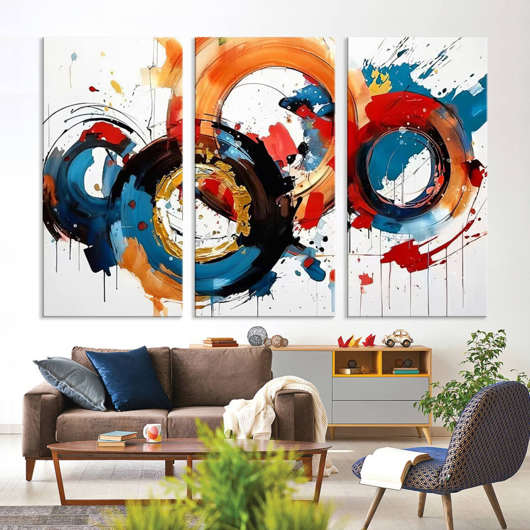 The Abstract Wall Art Rings Canvas Print, with its bold and colorful circular strokes, adorns the wall, epitomizing contemporary design.