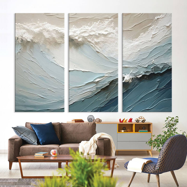 The Waves Abstract Wall Art Print, a captivating piece of modern framed abstract canvas, beautifully decorates the wall. This abstract painting is designed to enhance your living room decor and offers the convenience of being ready to hang.