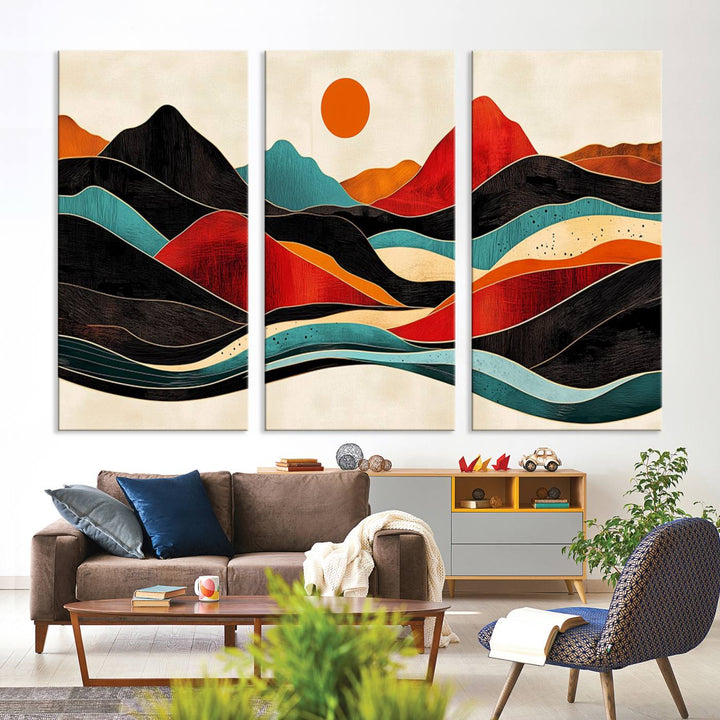 The Colorful Western Triptych Canvas features a vibrant mountain and sun design, making it perfect for modern kitchens or log cabin walls.