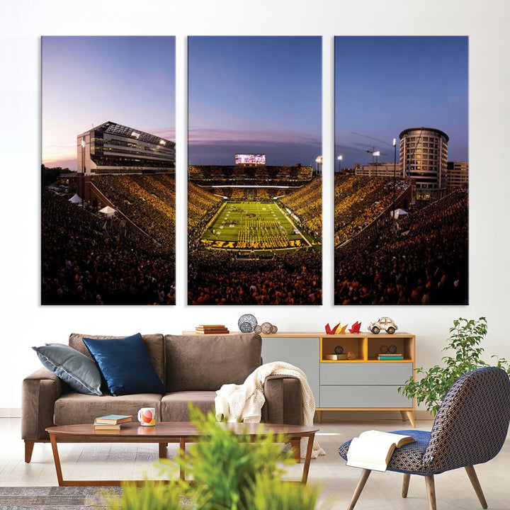 The Iowa Hawkeyes Kinnick Stadium Wall Art Canvas Print captures a sunset scene, making it perfect for display on a wall.