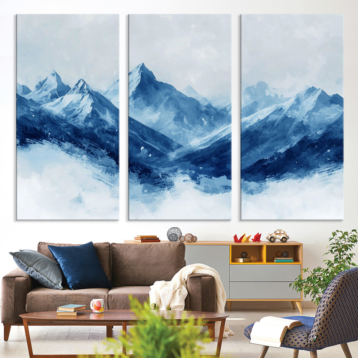 Peaceful watercolor-style painting of snowy blue mountains in soft tones, perfect for winter-themed or minimalist wall decor.