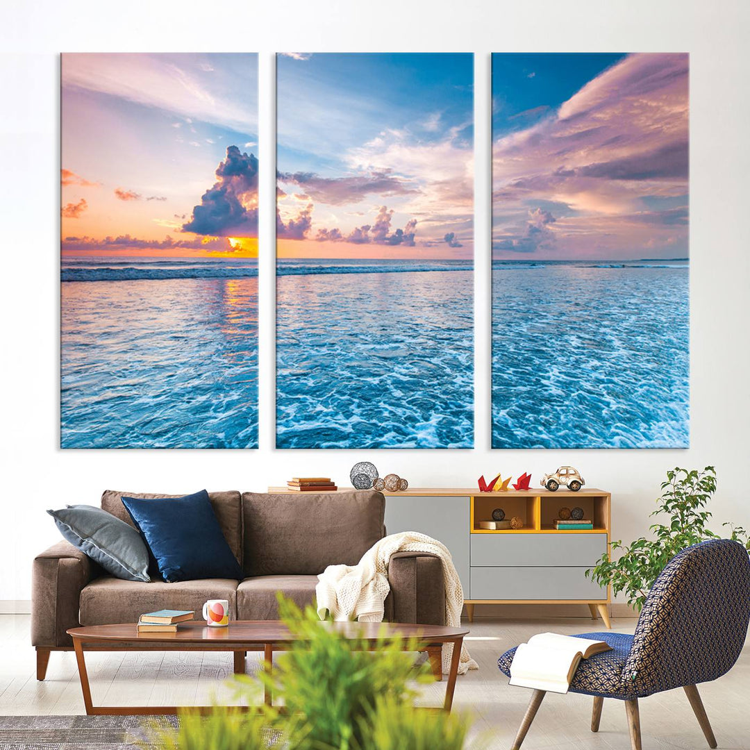 An Ocean Sunset Canvas Wall Art depicting a vibrant sky and rolling waves.