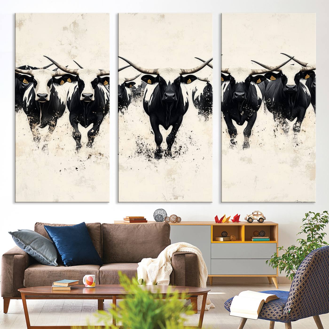Canvas artwork of black and white Texas longhorns in a bold stampede over a minimalist background, ideal for rustic modern or Western-themed decor.