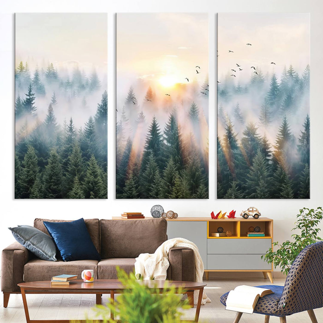 Misty Pine Forest Wall Art: A depiction of sunrise over foggy trees and birds against a bright sky; a framed woodland scene ideal for home or office decor.